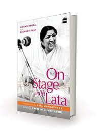 on stage with lata